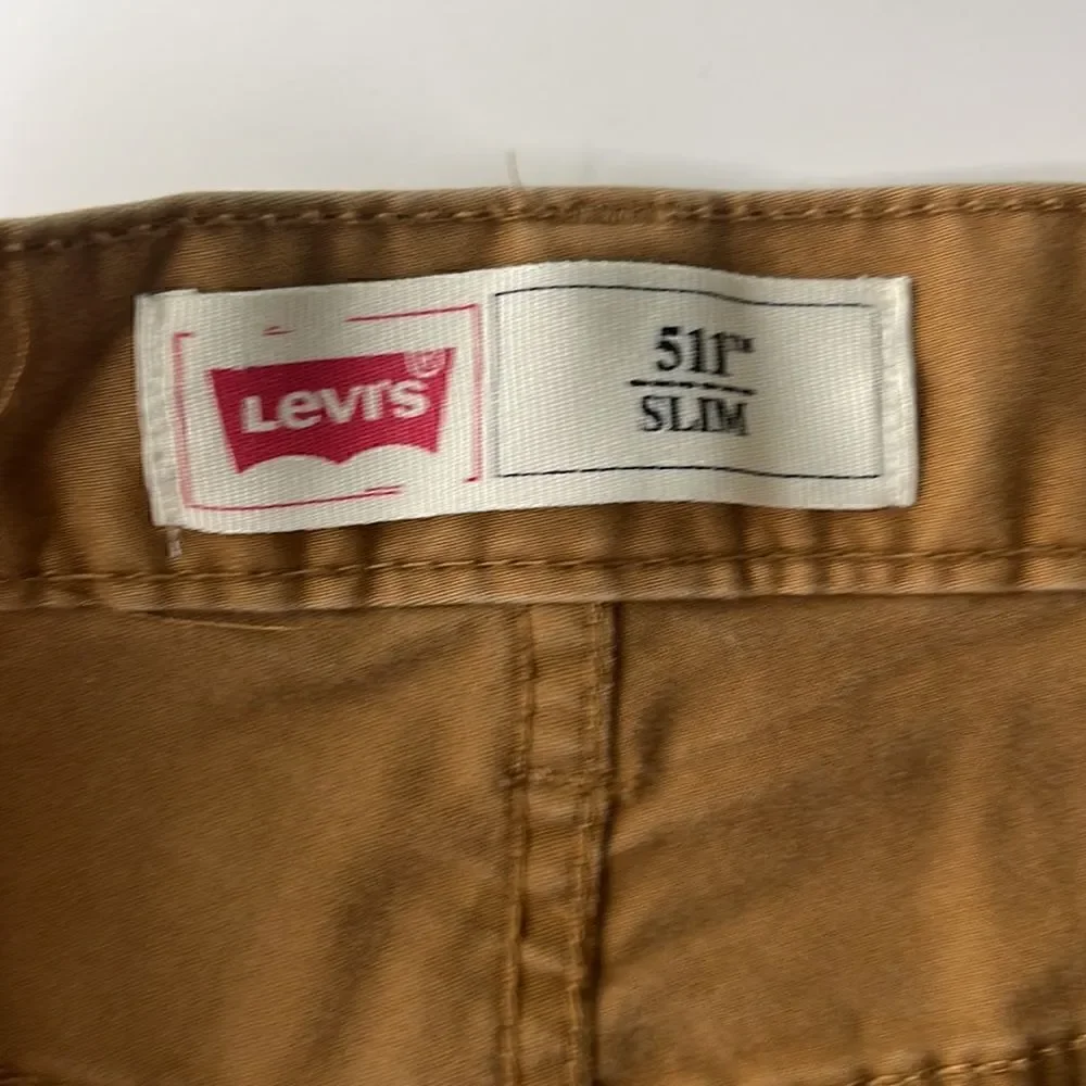 Levi’s 511 slim fit cotton khaki pants. Size 16 Regular. Slightly distressed